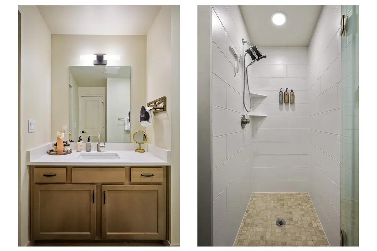 A spa-inspired bathroom with a stylish vanity and sink, a well-lit mirror, and a modern shower area. The clean lines and soothing color palette evoke a sense of refreshment and tranquility, perfect for unwinding after a day of adventure.